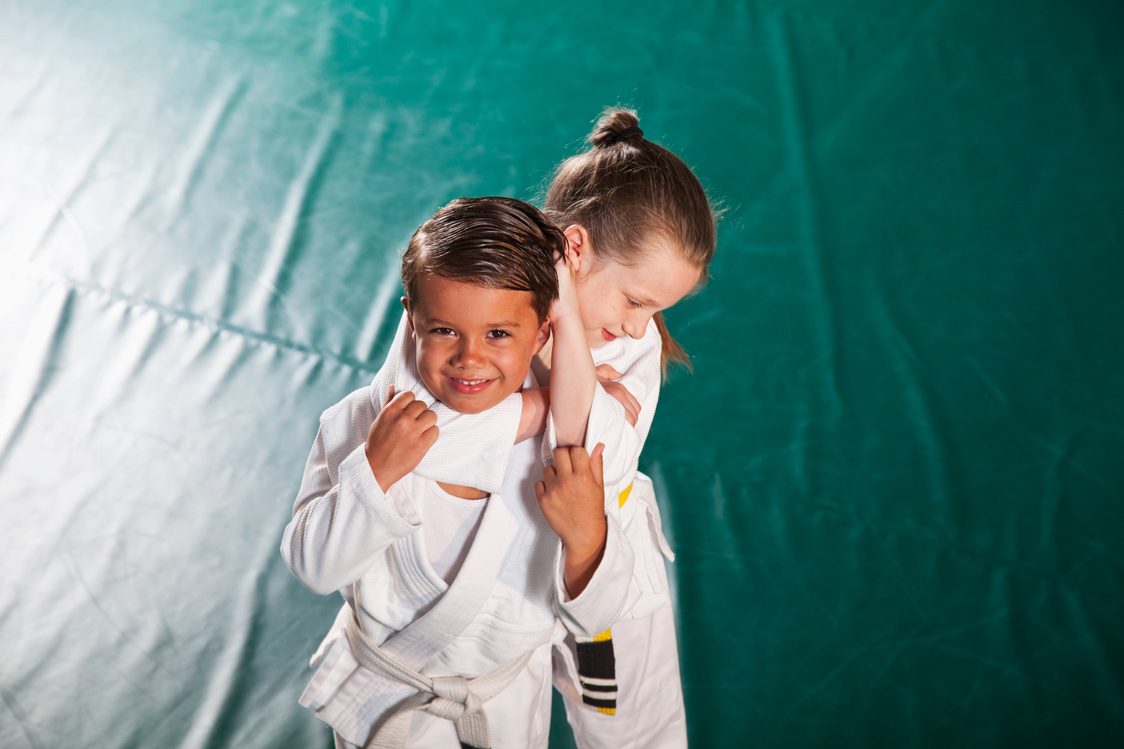 Children practicing Jiu-Jitsu chokehold